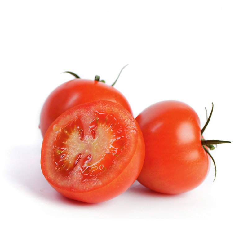 Sliced beef tomato showing meaty flesh for slicing markets